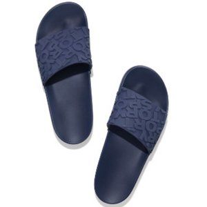 TORY SPORT Tory Burch Embossed Logo Slide Sandal
